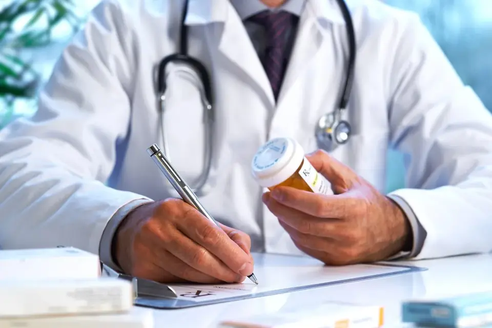 Licensed clinician reviewing a patient treatment plan